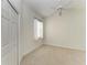 Bedroom with neutral carpet and a window for natural light at 9429 Discovery Ter # 102B, Bradenton, FL 34212