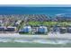 Ariel view showing ocean front condos and neighborhood featuring a lush golf course at 1000 Longboat Club Rd # 604, Longboat Key, FL 34228