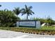 Elegant entrance sign for The Resort at Longboat Key Club amidst lush tropical landscaping at 1000 Longboat Club Rd # 604, Longboat Key, FL 34228