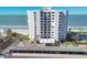 A bright, airy beachfront condo features private balconies with stunning ocean views and community amenities at 1000 Longboat Club Rd # 604, Longboat Key, FL 34228