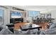 Open concept living room with hardwood floors and modern decor at 1000 Longboat Club Rd # 604, Longboat Key, FL 34228