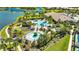 Aerial view of a resort-style community pool and clubhouse at 10510 Giddens Pl, Palmetto, FL 34221