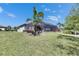 Beautiful backyard of home features a screened in lanai at 10510 Giddens Pl, Palmetto, FL 34221