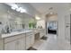 Beautiful bathroom with granite countertops, double sinks, and modern fixtures providing a spa-like experience at 10510 Giddens Pl, Palmetto, FL 34221