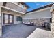 Inviting patio with stone accents, comfortable seating, and stylish decor for outdoor living at 10510 Giddens Pl, Palmetto, FL 34221