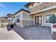 Inviting home patio with stone accents, comfortable seating, and stylish decor for relaxation at 10510 Giddens Pl, Palmetto, FL 34221