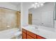 Bathroom with tub/shower combo and vanity at 12091 Amica Loop, Venice, FL 34293