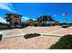 Beautiful entrance with manicured landscaping and elegant architecture, creating a welcoming and luxurious arrival experience at 12091 Amica Loop, Venice, FL 34293