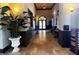 Welcoming lobby with neutral decor, a beautiful tile floor, and comfortable seating for residents and guests at 12091 Amica Loop, Venice, FL 34293
