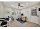 Functional office featuring wood floors, desk, natural light and ceiling fan at 1240 Fox Creek Dr, Sarasota, FL 34240