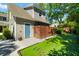 Cozy backyard featuring artificial turf, a bocce court, and a privacy fence at 1434 Ladue Ln, Sarasota, FL 34231