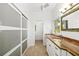 Bright bathroom with a single vanity and a shower room at 1434 Ladue Ln, Sarasota, FL 34231