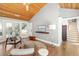 Comfortable living room with hardwood floors and vaulted ceilings at 1434 Ladue Ln, Sarasota, FL 34231