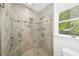 Shower room that features natural light from a window at 1434 Ladue Ln, Sarasota, FL 34231