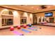Bright fitness center featuring exercise balls, mats, and a mirror wall for a complete workout experience at 20114 Uffizi Ct, Venice, FL 34293