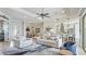 Open floor plan with spacious living room, dining area, and modern kitchen at 20114 Uffizi Ct, Venice, FL 34293