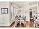 Cozy breakfast nook with ample natural light and hardwood floors throughout at 2020 Calusa Lakes Blvd, Nokomis, FL 34275