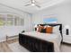 Inviting bedroom with neutral tones, comfortable bedding, and stylish window treatments at 2159 Hawthorne St, Sarasota, FL 34239