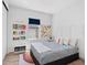 Charming bedroom featuring playful decor, comfortable bed, and ample natural light at 2159 Hawthorne St, Sarasota, FL 34239