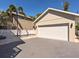Detached garage with a wide driveway and access to a pristine backyard oasis at 2159 Hawthorne St, Sarasota, FL 34239