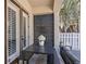 Covered patio with comfortable seating, creating an inviting outdoor living space at 2159 Hawthorne St, Sarasota, FL 34239