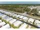 Gorgeous aerial view showcasing the delightful neighborhood amenities and surrounding greenery at 216 Palm Air Dr, Osprey, FL 34229