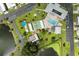 Scenic aerial view showcasing community amenities, including a swimming pool, shuffleboard courts, and a clubhouse at 216 Palm Air Dr, Osprey, FL 34229