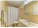 Updated bathroom featuring shower-tub combo, tile floors, and neutral walls at 216 Palm Air Dr, Osprey, FL 34229