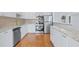 Updated kitchen featuring stainless steel appliances, granite countertops, and ample cabinet space at 218 80Th N Ave, St Petersburg, FL 33702