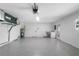 Spacious garage with clean floors and utility sink at 2242 Sunnyside Ln, Sarasota, FL 34239