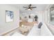 Inviting living room showcasing an open floor plan and a view into the modern kitchen at 2242 Sunnyside Ln, Sarasota, FL 34239