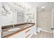 Updated bathroom with double sinks, granite counters, and large mirror at 2320 Terra Ceia Bay Blvd # 305, Palmetto, FL 34221