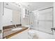 Bathroom with granite countertop, white cabinets, and shower with glass door at 2320 Terra Ceia Bay Blvd # 305, Palmetto, FL 34221