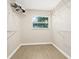 Spacious walk-in closet with window, wire shelving, and wood-look floors at 2320 Terra Ceia Bay Blvd # 305, Palmetto, FL 34221