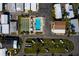 Ariel view of community with pool, shuffleboard, and boat storage at 2601 Gulf N Dr # B24, Bradenton Beach, FL 34217