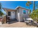 Charming beach house featuring a cozy deck with seating, perfect for outdoor relaxation at 2601 Gulf N Dr # B24, Bradenton Beach, FL 34217
