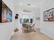 Cozy breakfast nook with natural light from the surrounding windows at 3322 Bayou Rd, Longboat Key, FL 34228