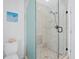 Modern shower with a glass enclosure, sleek fixtures, and a clean design enhancing the bathroom's appeal at 3322 Bayou Rd, Longboat Key, FL 34228