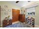 ' bedroom featuring toys, a closet, and a gray patterned rug at 3526 Austin St, Sarasota, FL 34231