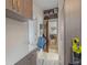 Functional hallway area featuring modern cabinetry, countertop, and storage solutions at 3526 Austin St, Sarasota, FL 34231