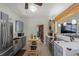 Kitchen features gray cabinets, butcher block island, and stainless-steel appliances at 3526 Austin St, Sarasota, FL 34231