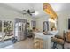 Kitchen with gray cabinetry, white countertops, and stainless steel appliances at 3526 Austin St, Sarasota, FL 34231