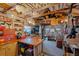 Interior of the outbuilding with workbenches and various tools for hobbies at 3526 Austin St, Sarasota, FL 34231