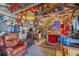 Cluttered interior view of outbuilding featuring workbenches and various tools at 3526 Austin St, Sarasota, FL 34231