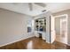 Stylish bedroom features laminate floors, a built-in desk with shelving, and a window for natural light at 3606 Garden Lakes Clenet, Bradenton, FL 34203