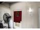 Game room features dart board, fan, and access to outdoor area at 3606 Garden Lakes Clenet, Bradenton, FL 34203