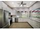 Modern kitchen with stainless steel appliances, ample counter space, and natural light at 3606 Garden Lakes Clenet, Bradenton, FL 34203