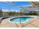 Enjoy the outdoors with this refreshing pool inside a screened enclosure overlooking the pond at 3606 Garden Lakes Clenet, Bradenton, FL 34203