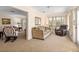 Comfortable living room featuring lots of natural light and a relaxing seating arrangement at 3626 Medford Ln # 1537, Sarasota, FL 34232
