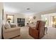 Spacious living room with carpet, neutral walls, and comfortable seating at 3626 Medford Ln # 1537, Sarasota, FL 34232